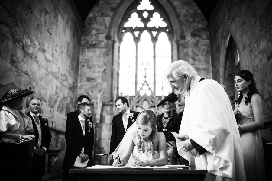089-candid-photograph-bridal-ceremony-signing