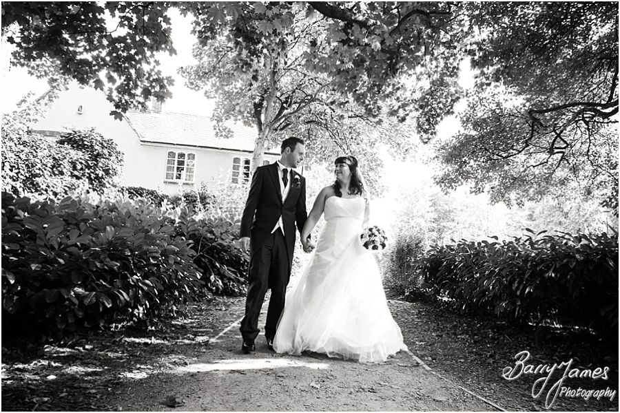 Elegant natural portraits of the bride and groom around the wonderful setting of Walsall Arboretum in Walsall by Walsall Wedding Photographer Barry James