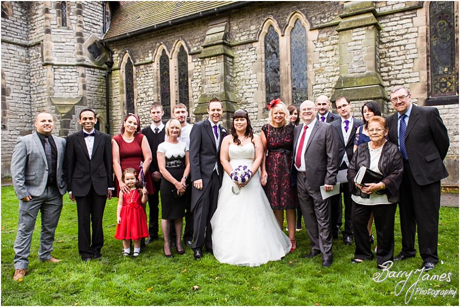 Relaxed family photographs in the church grounds at Rushall Parish Church in Walsall by Walsall Wedding Photographer Barry James