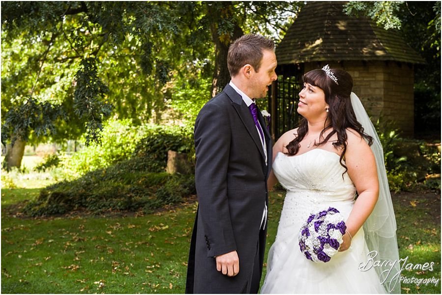 Elegant natural portraits of the bride and groom around the wonderful setting of Walsall Arboretum in Walsall by Walsall Wedding Photographer Barry James