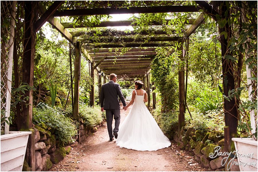 Creative and relaxed photographs of the bride and groom around the grounds at Hawkesyard Estate in Rugeley by Rugeley Wedding Photographer Barry James