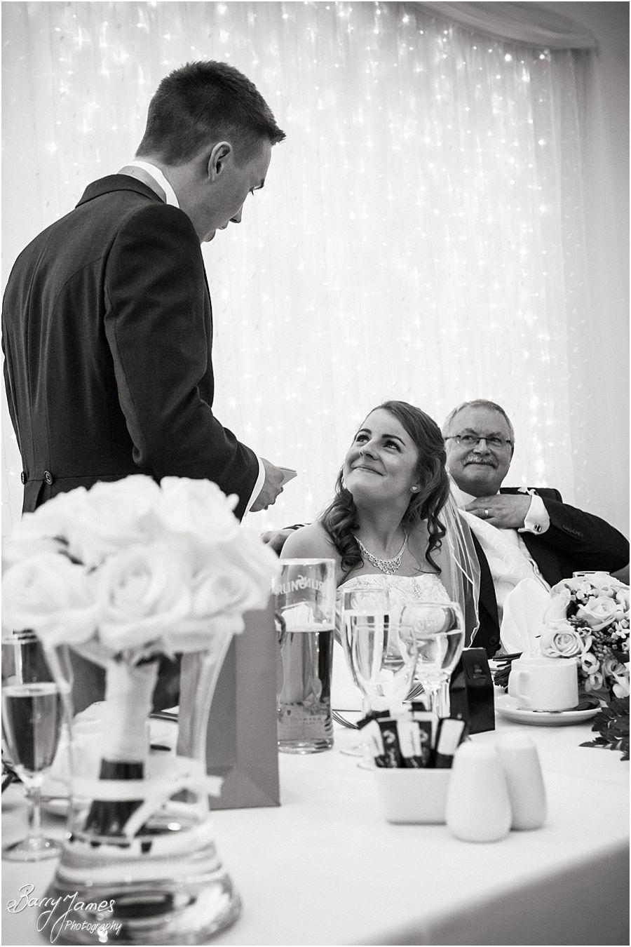 Fun candid photographs of speeches at Hawkesyard Hall in Rugeley by Modern Wedding Photographer Barry James