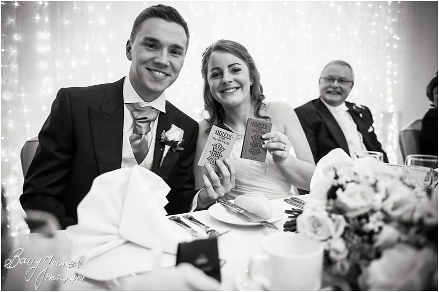 Fun candid photographs of speeches at Hawkesyard Hall in Rugeley by Modern Wedding Photographer Barry James