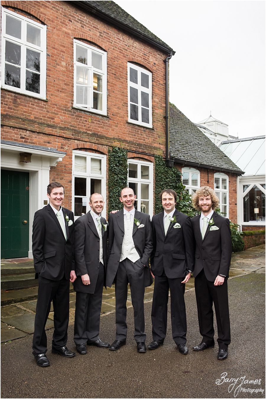 Contemporary and fun portraits of groom and groomsmen at The Moat House in Acton Trussell by Cannock Wedding Photographer Barry James
