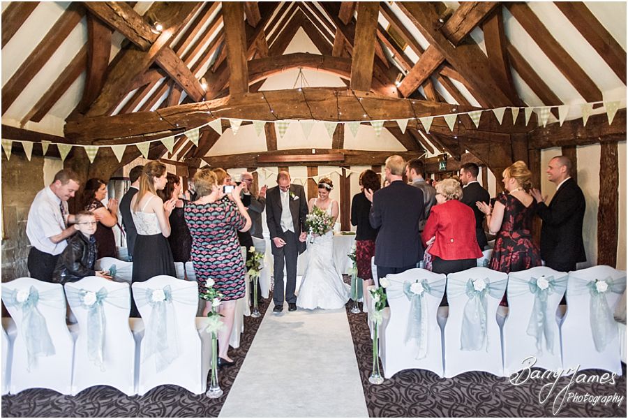 Capturing the beautiful wedding ceremony with contemporary and candid photographs at The Moat House in Acton Trussell by Full Time Professional Wedding Photographer Barry James