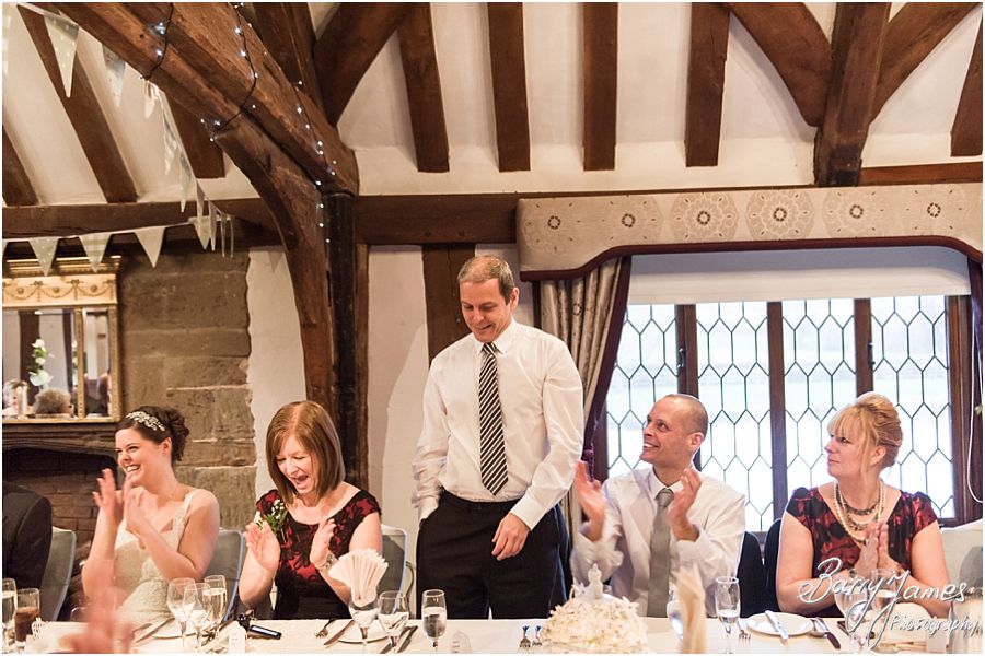 Candid photos of the speeches and guest reactions at The Moat House in Acton Trussell by Creative Contemporary Wedding Photographer Barry James