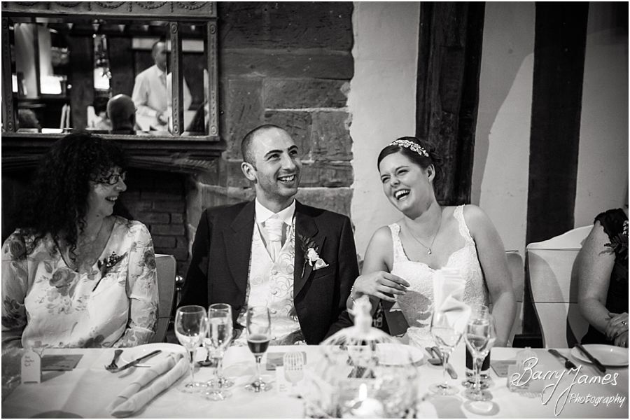 Candid photos of the speeches and guest reactions at The Moat House in Acton Trussell by Creative Contemporary Wedding Photographer Barry James