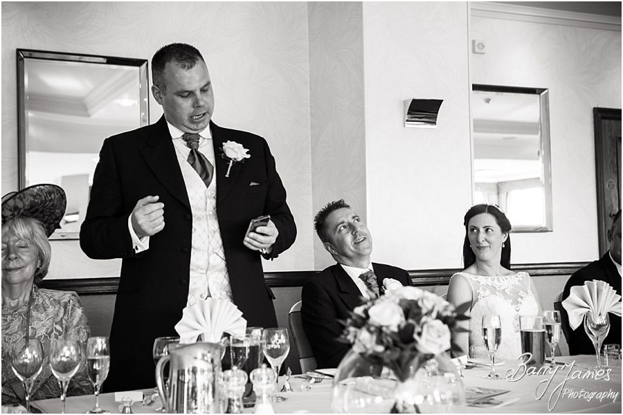 Creative modern wedding photography that eschews the cheese for natural fun during wedding day at The Moat House in Acton Trussell by Award Winning Wedding Photographer Barry James