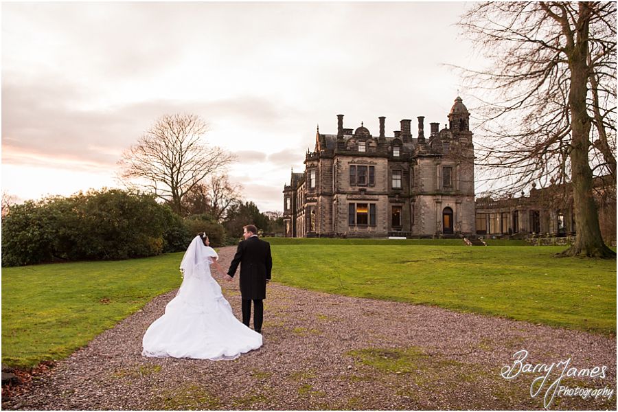 Elegant winter wedding photographs at Sandon Hall in Stafford by Traditional Wedding Photographers Barry James