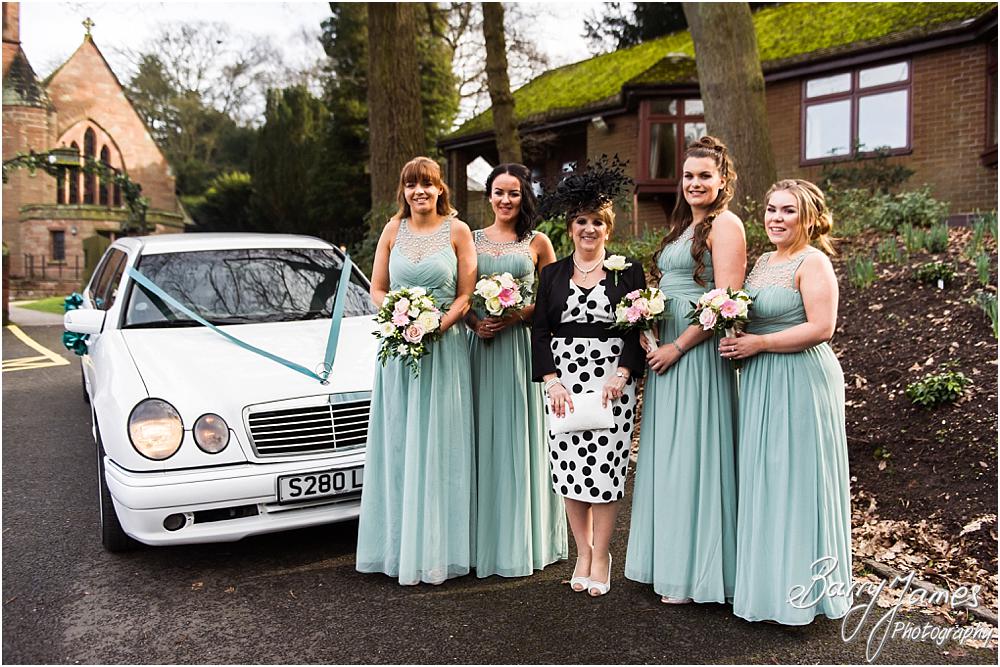 Contemporary and creative wedding photographs of the bridal party arrival at St Peters Little Aston in Sutton Coldfield by Sutton Coldfield Wedding Photographer Barry James