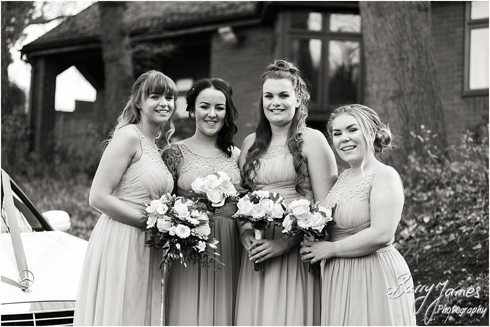 Contemporary and creative wedding photographs of the bridal party arrival at St Peters Little Aston in Sutton Coldfield by Sutton Coldfield Wedding Photographer Barry James