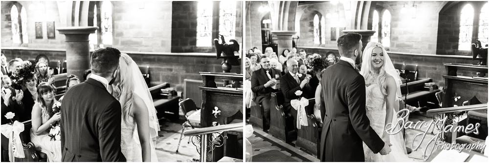 Natural candid photographs capturing the wedding ceremony at St Peters Little Aston in Sutton Coldfield by Sutton Coldfield Wedding Photographer Barry James