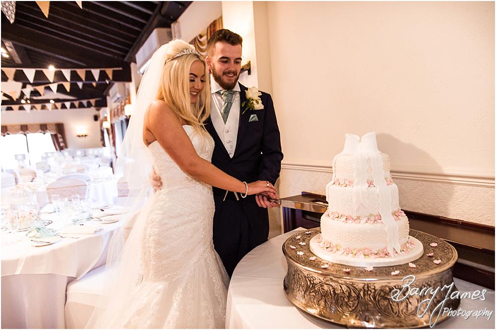 Beautiful wedding cake designed to match the theme of the wedding perfectly at Oak Farm Hotel in Cannock by CannockWedding Photographer Barry James