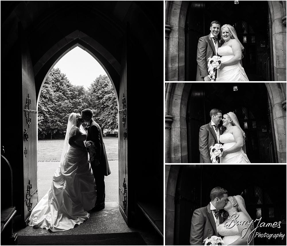 Creative photographs of the bride and groom in the beautiful doorway at St Marks in Great Wyrley by Penkridge Wedding Photographer Barry James
