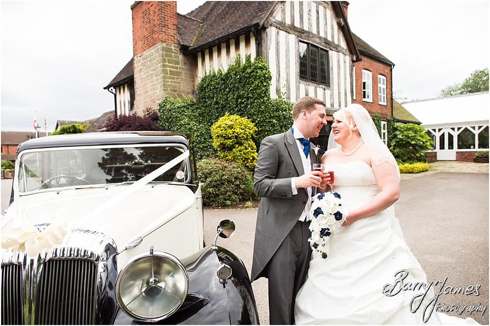 Arriving in style with Aarons Cars at The Moat House in Acton Trussell by Penkridge Wedding Photographer Barry James