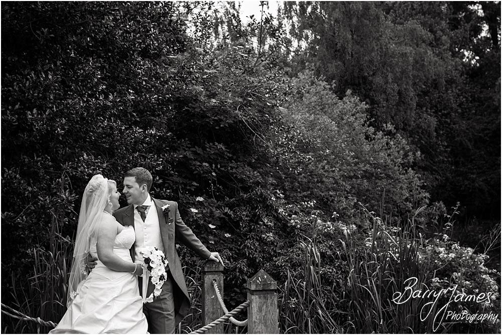 Contemporary relaxed portraits around the beautiful gardens of The Moat House in Acton Trussell by Penkridge Wedding Photographer Barry James