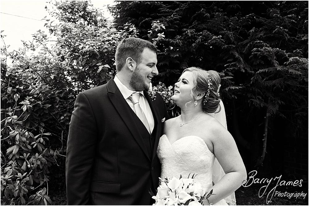 Creative and contemporary portraits of the bride and groom in the gardens at Oak Farm in Cannock by Cannock Wedding Photographer Barry James