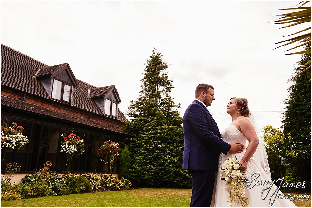 Beautiful photographs of the bride and groom utilising the fabulous setting at Oak Farm in Cannock by Cannock Wedding Photographer Barry James