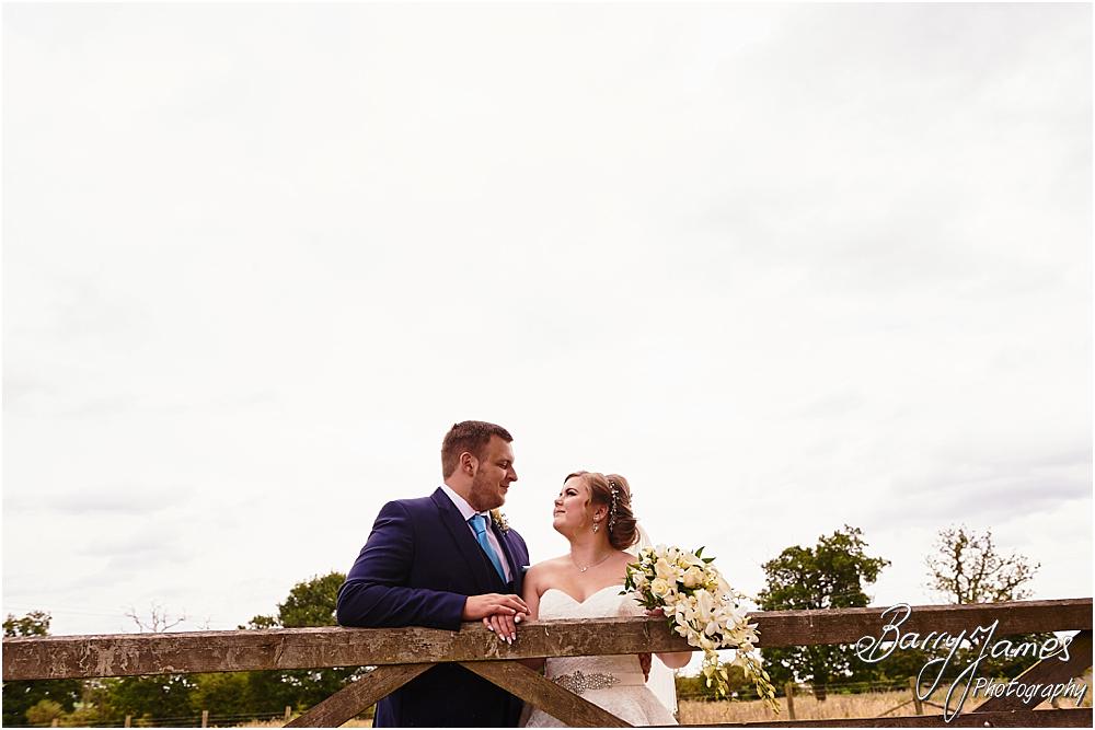 Gorgeous photographs of the Bride and Groom in the rear gardens at Oak Farm in Cannock by Cannock Wedding Photographer Barry James