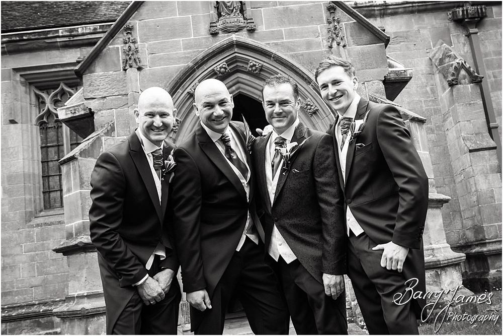 Contemporary portraits of the groomsmen at Holy Angels Church at Hoar Cross Hall in Staffordshire by Stafford Wedding Photographer Barry James