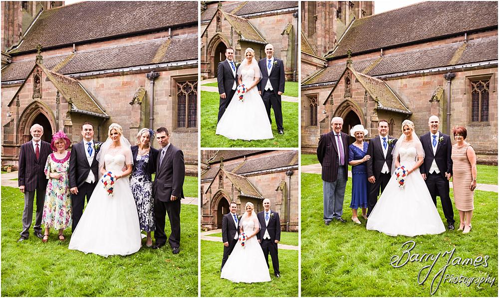 Relaxed conkemorpary group photographs in the church yard at Hoar Cross Hall in Staffordshire by Stafford Wedding Photographer Barry James