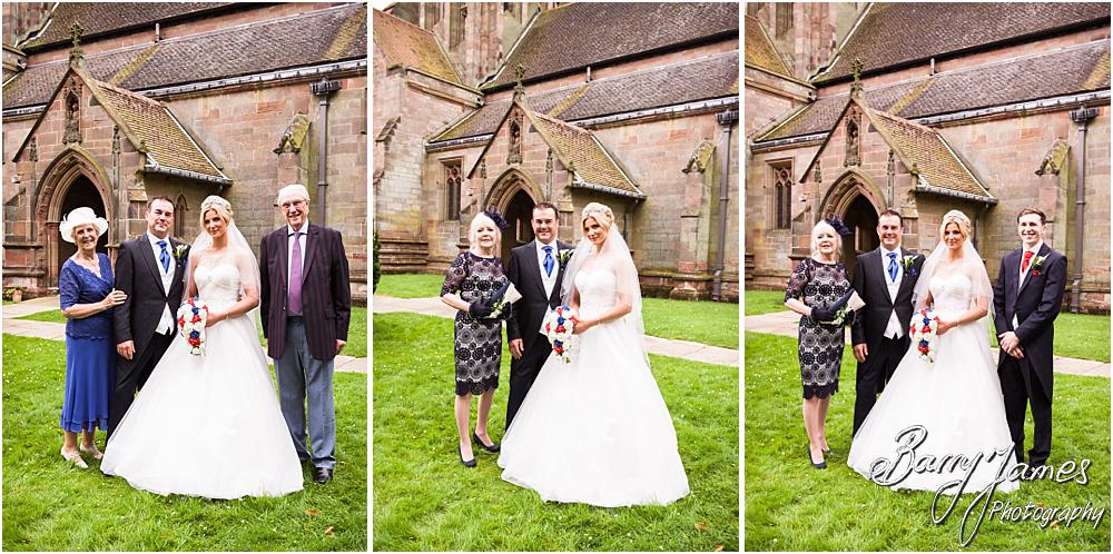 Relaxed conkemorpary group photographs in the church yard at Hoar Cross Hall in Staffordshire by Stafford Wedding Photographer Barry James