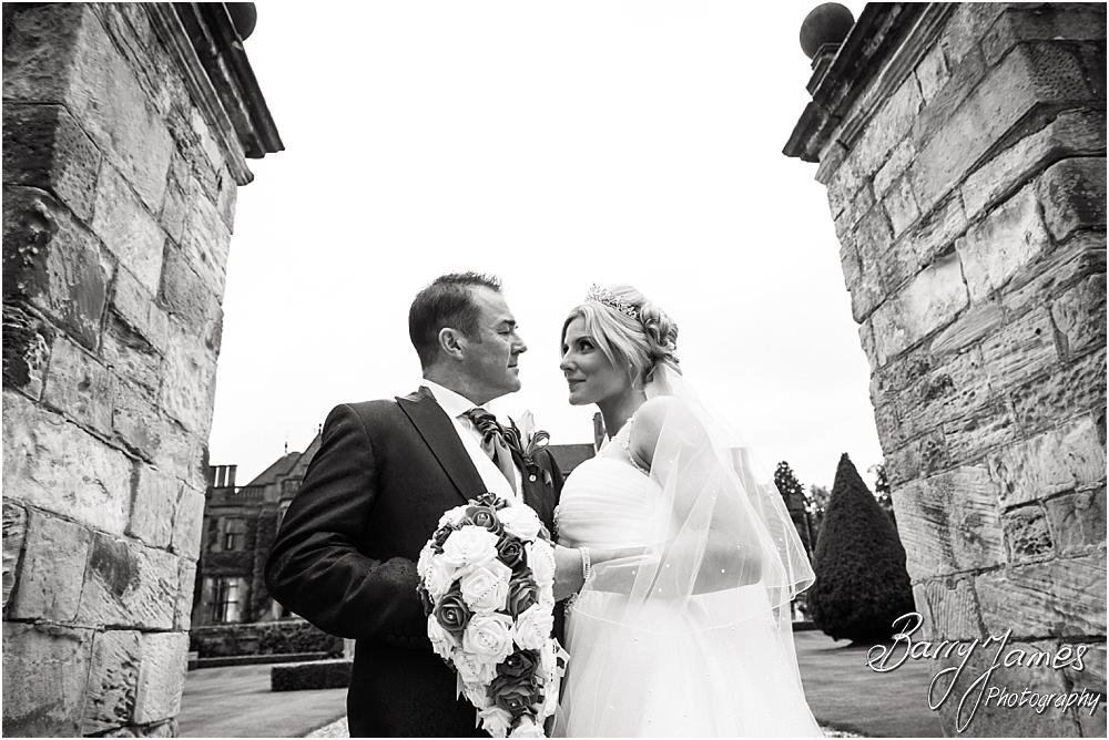 Creative portraits of the bride and groom utilising the stunning setting of Hoar Cross Hall in Staffordshire by Stafford Wedding Photographer Barry James