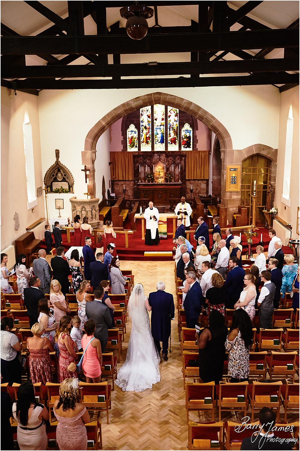 Unobtrusive photographs of the beautiful wedding ceremony at St Michaels Church Pelsall by Walsall Wedding Photographer Barry James