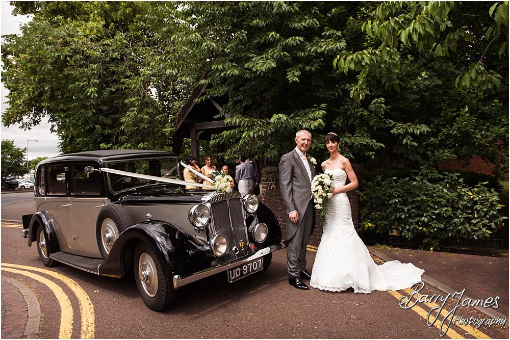Arriving in style for the wedding at All Saints Church in Bloxwich by Walsall Wedding Photographer Barry James