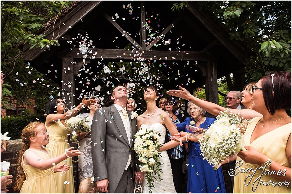 Confetti fun at All Saints Church in Bloxwich by Walsall Wedding Photographer Barry James