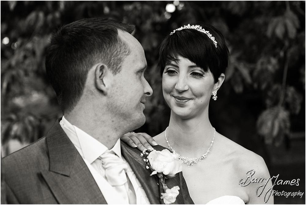 Creative portraits of the Bride and Groom around the beautiful gardens at Rodbaston Hall in Penkridge by Walsall Wedding Photographer Barry James