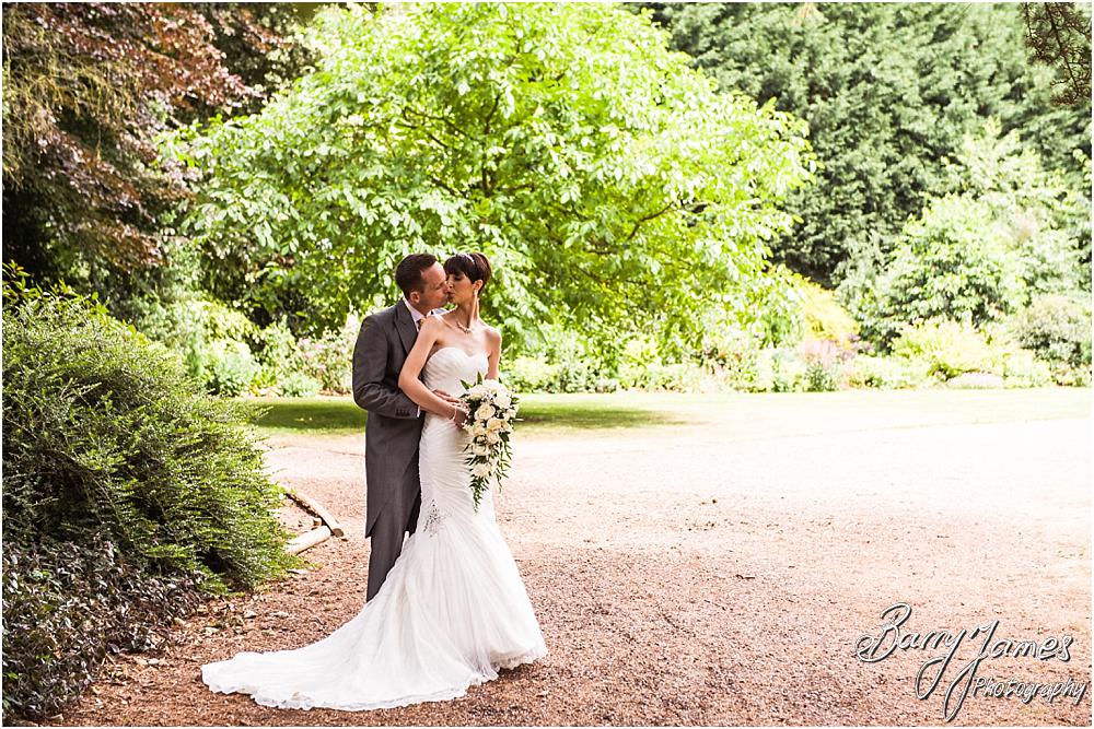 Creative and contemporary portraits of the bride and groom around the beautiful setting of Rodbaston Hall in Penkridge by Walsall Wedding Photographer Barry James