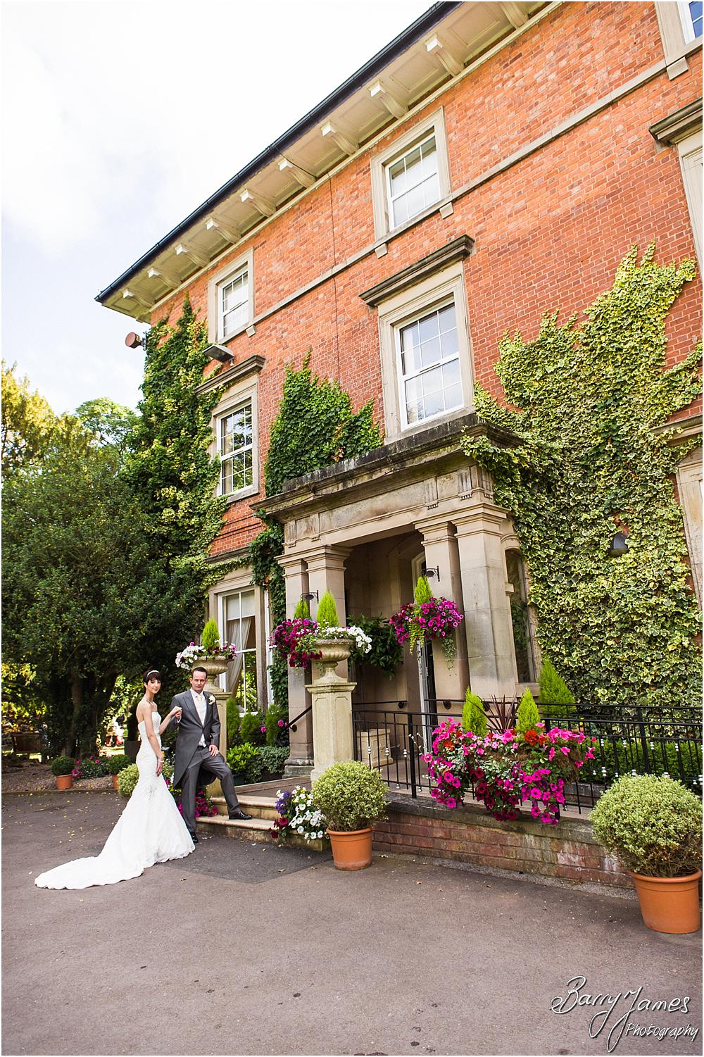 Creative evening portraits of the Bride and Groom at Rodbaston Hall in Penkridge by Walsall Wedding Photographer Barry James