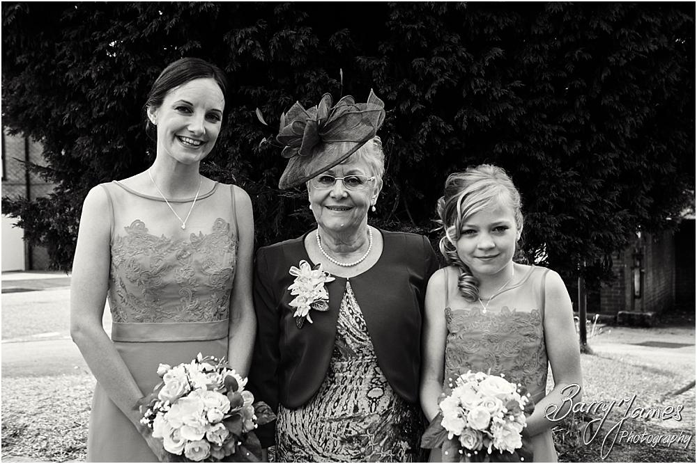 Contemporary portraits of the bridal party at Brownhills Methodist Church in Walsall by Walsall Wedding Photographer Barry James