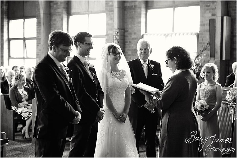 Unobtrusive storytelling photographs of the beautiful wedding ceremony at Brownhills Methodist Church in Walsall by Walsall Wedding Photographer Barry James