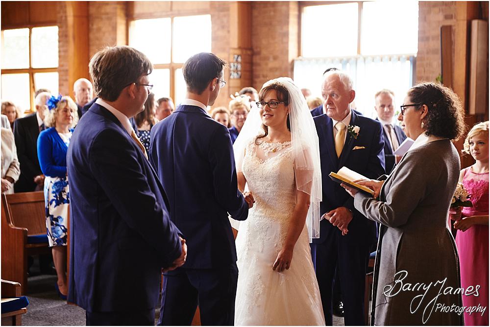 Unobtrusive storytelling photographs of the beautiful wedding ceremony at Brownhills Methodist Church in Walsall by Walsall Wedding Photographer Barry James