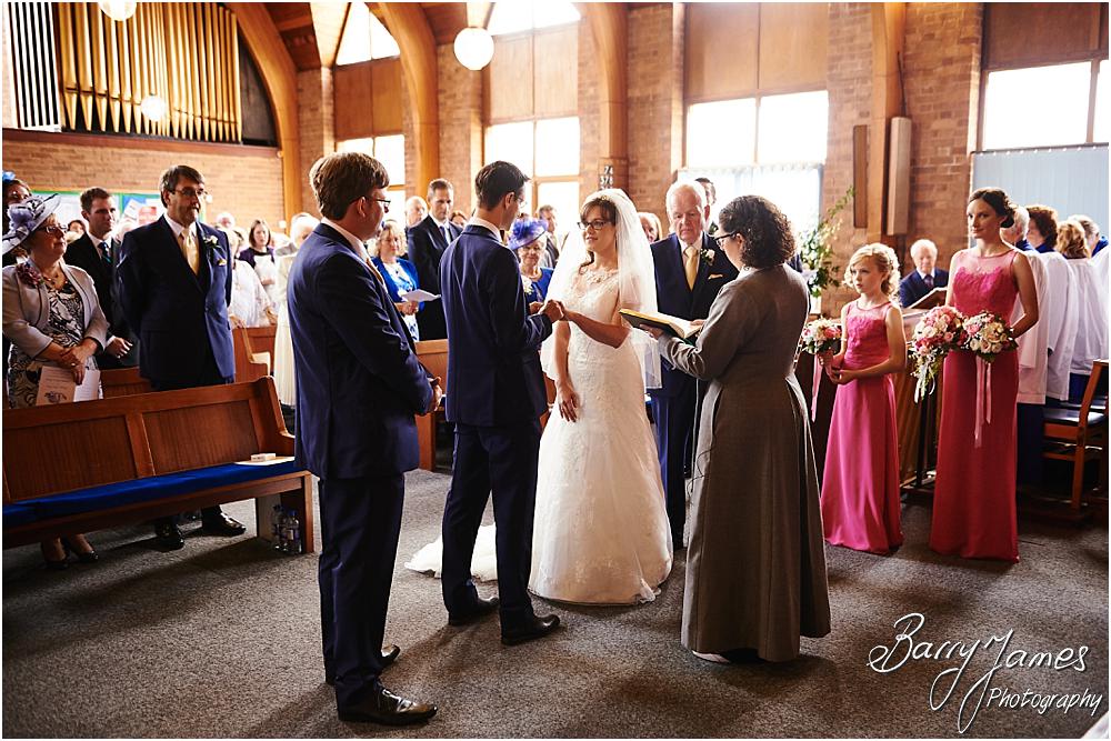 Unobtrusive storytelling photographs of the beautiful wedding ceremony at Brownhills Methodist Church in Walsall by Walsall Wedding Photographer Barry James