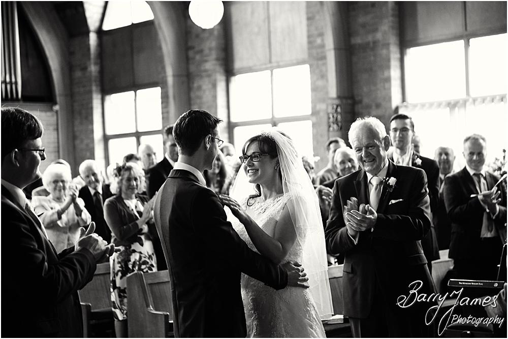 Unobtrusive storytelling photographs of the beautiful wedding ceremony at Brownhills Methodist Church in Walsall by Walsall Wedding Photographer Barry James