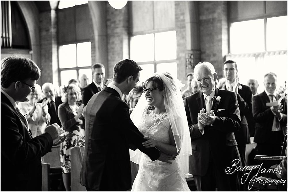 Unobtrusive storytelling photographs of the beautiful wedding ceremony at Brownhills Methodist Church in Walsall by Walsall Wedding Photographer Barry James