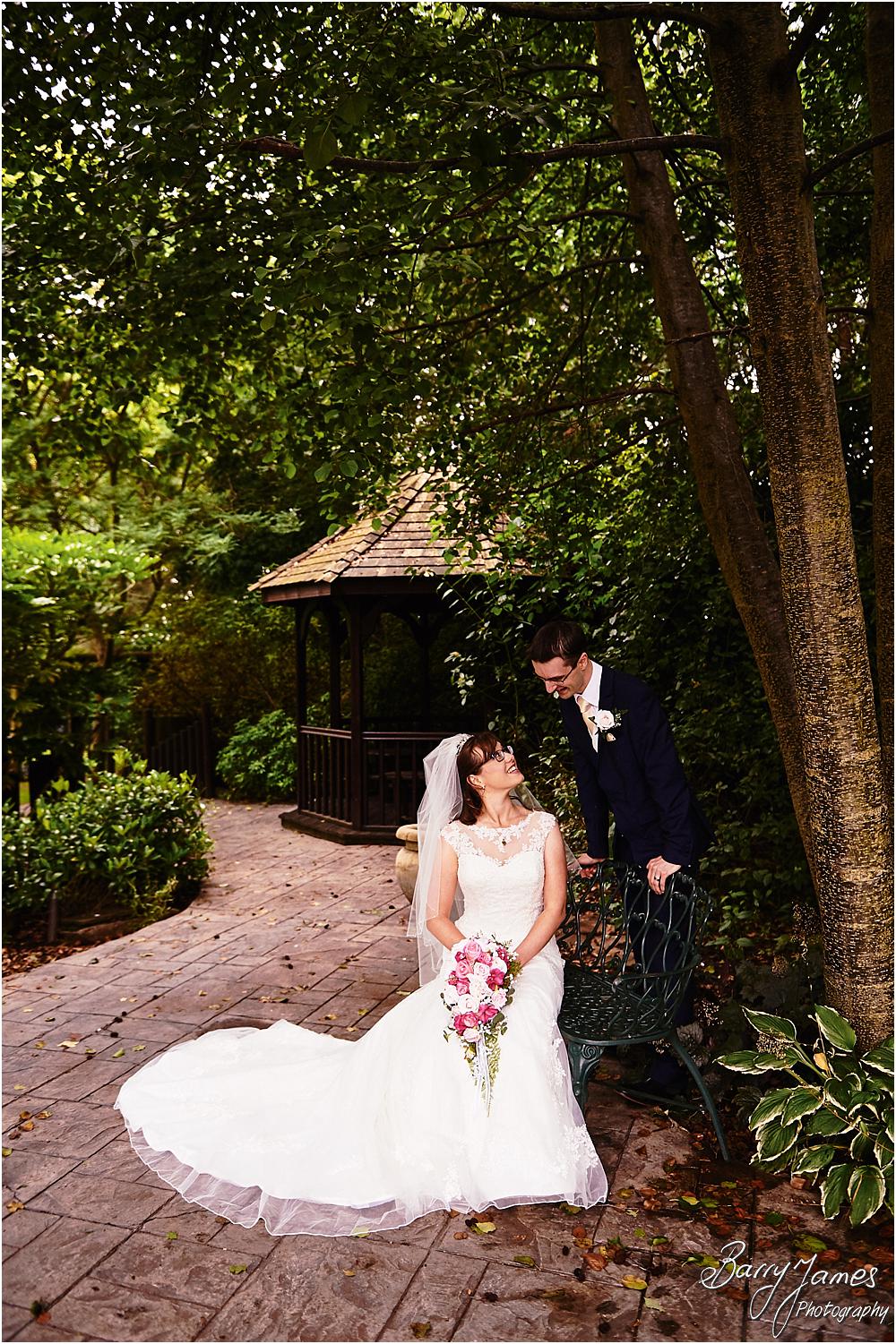 Relaxed elegant portraits of the bride and groom around the grounds of The Fairlawns in Walsall by Walsall Wedding Photographer Barry James