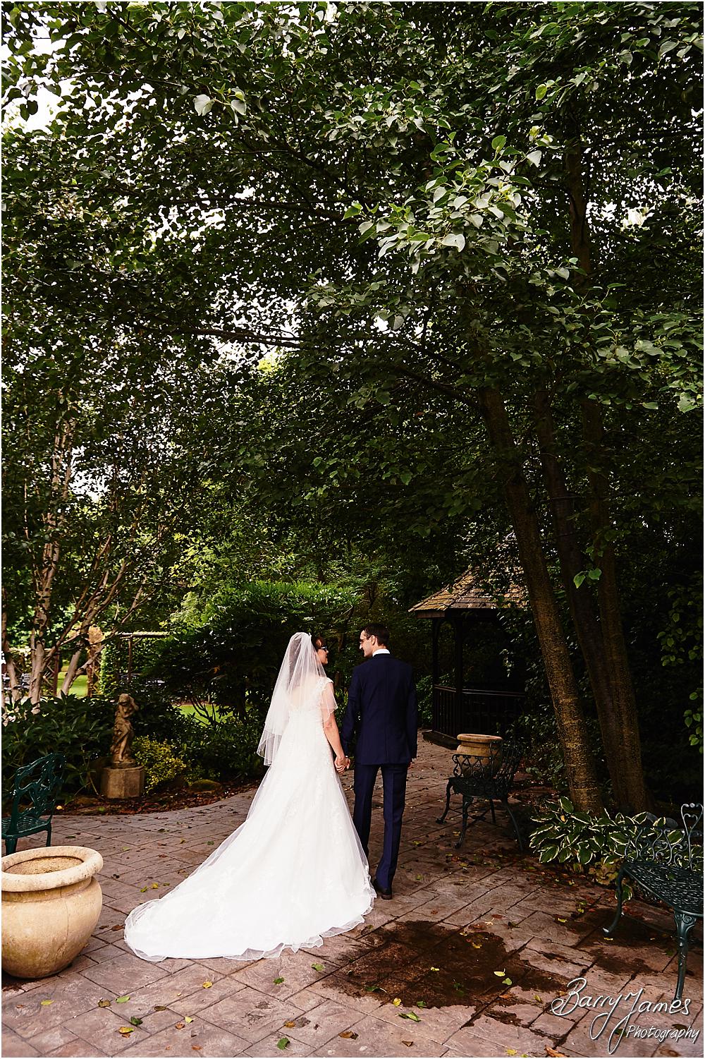 Relaxed elegant portraits of the bride and groom around the grounds of The Fairlawns in Walsall by Walsall Wedding Photographer Barry James
