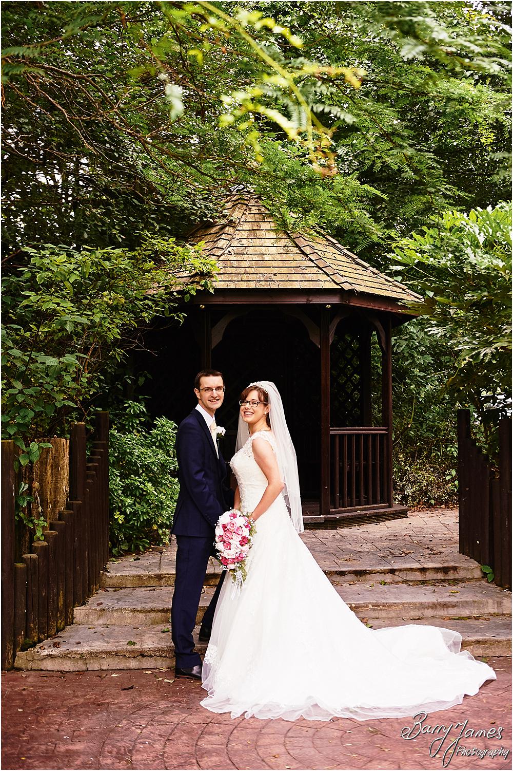 Elegant relaxed portraits of the bride and groom around the grounds of The Fairlawns in Walsall by Walsall Wedding Photographer Barry James