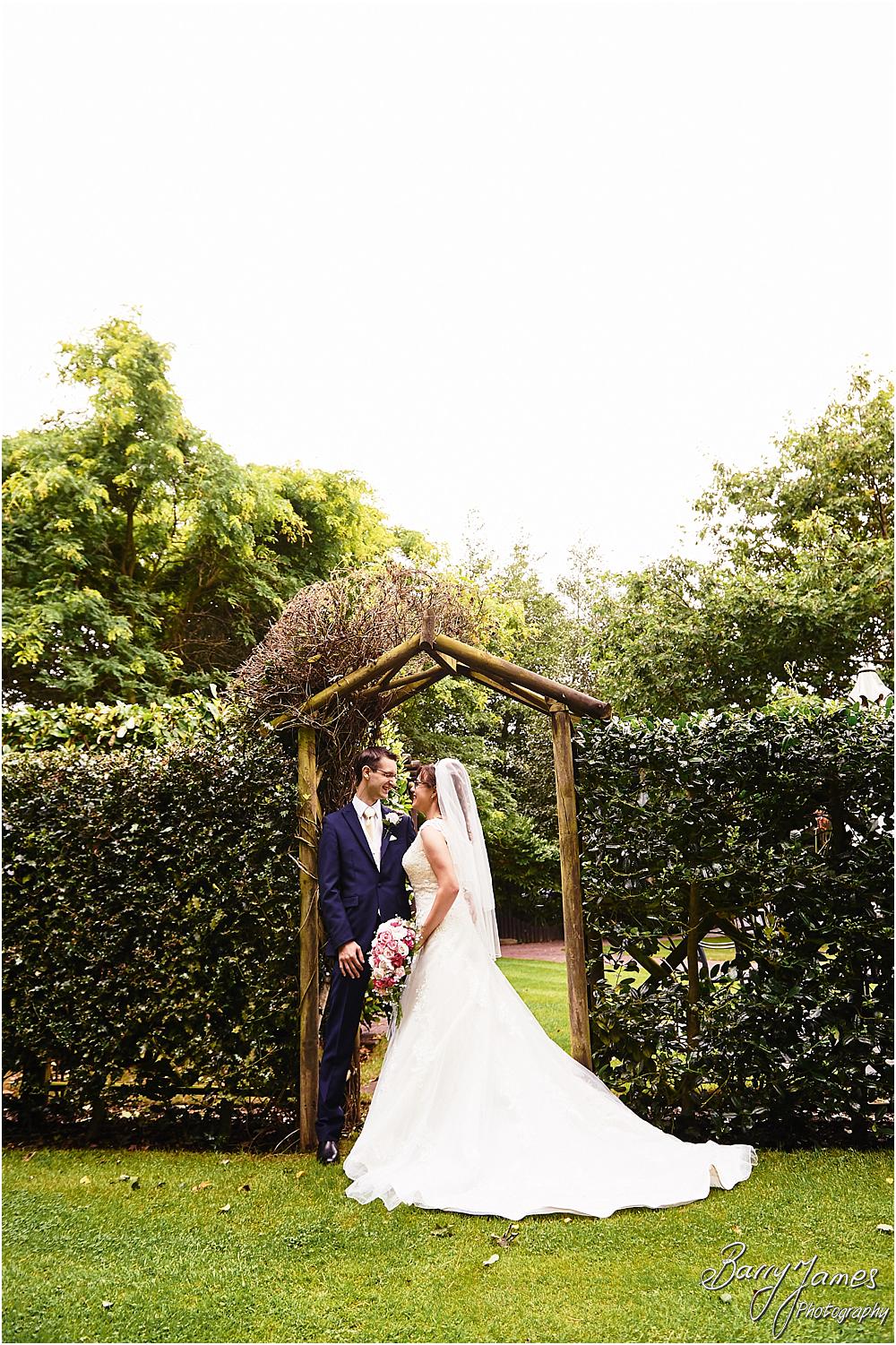 Elegant relaxed portraits of the bride and groom around the grounds of The Fairlawns in Walsall by Walsall Wedding Photographer Barry James
