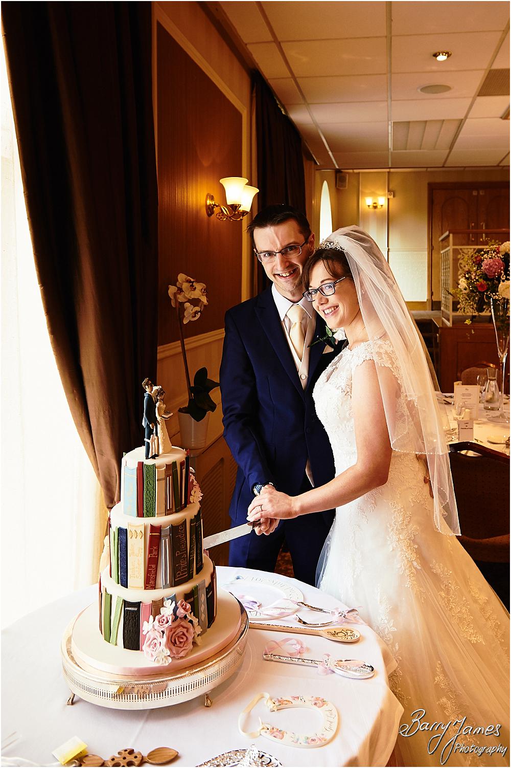 Cake cutting fun at The Fairlawns in Walsall by Walsall Wedding Photographer Barry James