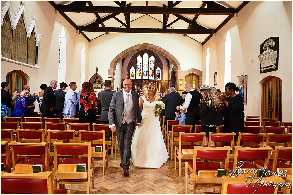 Creative unobtrusive photographs of the wedding ceremony at St Michaels Church in Pelsall by Walsall Wedding Photographer Barry James