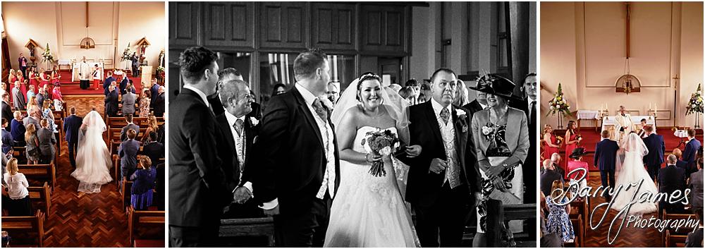 Unobtrusive storytelling photographs of the wedding ceremony at St Annes at Streetly by Wedding Photographer Barry James