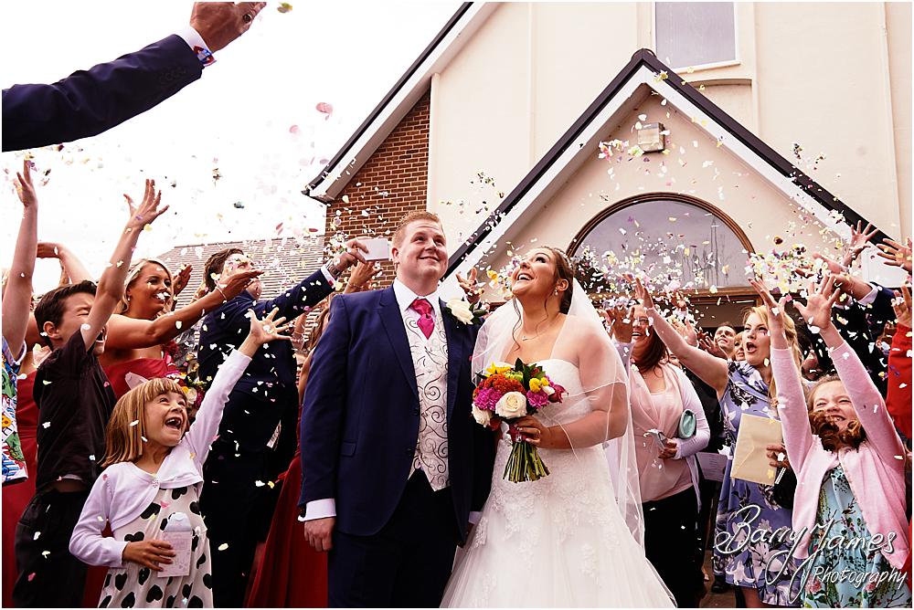 Confetti fun at St Annes at Streetly by Wedding Photographer Barry James