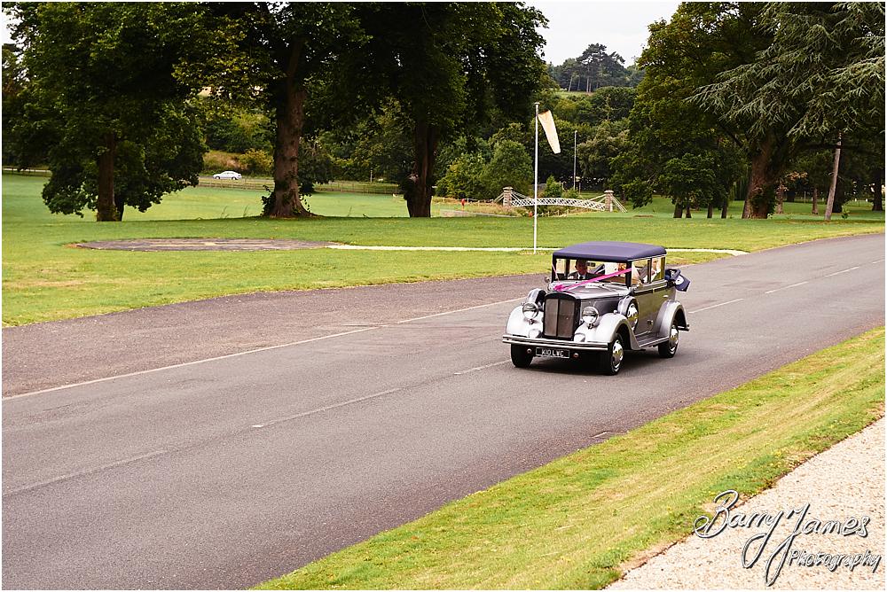 Arriving in style at Chateau Impney at Droitwich by Wedding Photographer Barry James