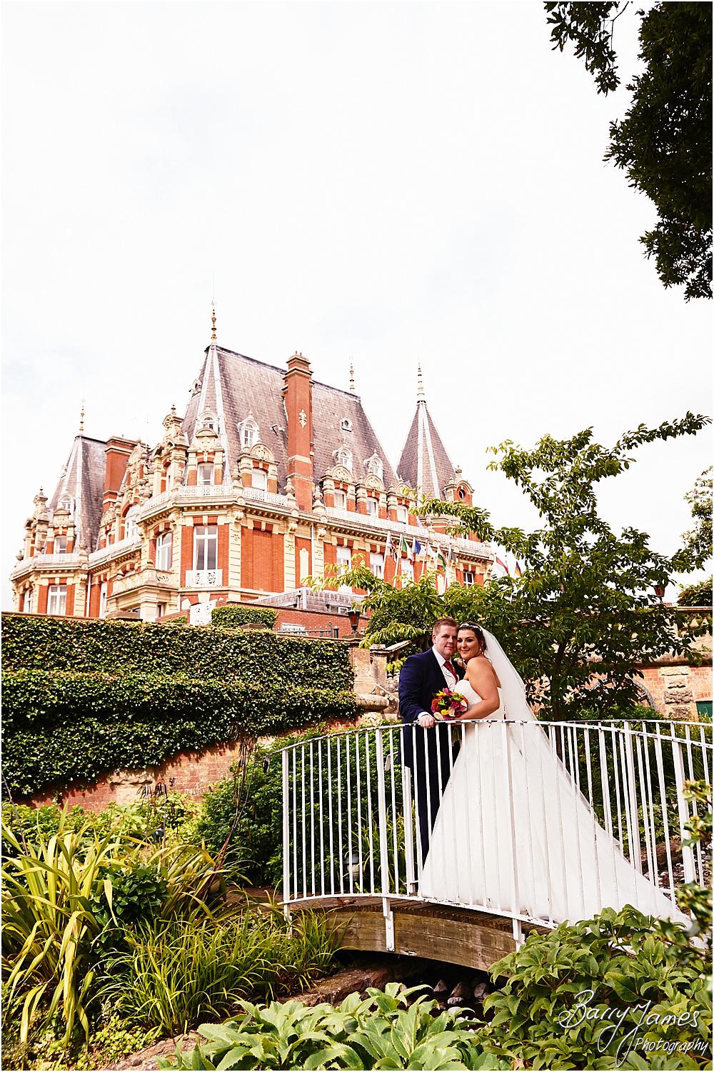 Creative natural wedding portraits around the stunning grounds and gardens at Chateau Impney at Droitwich by Wedding Photographer Barry James