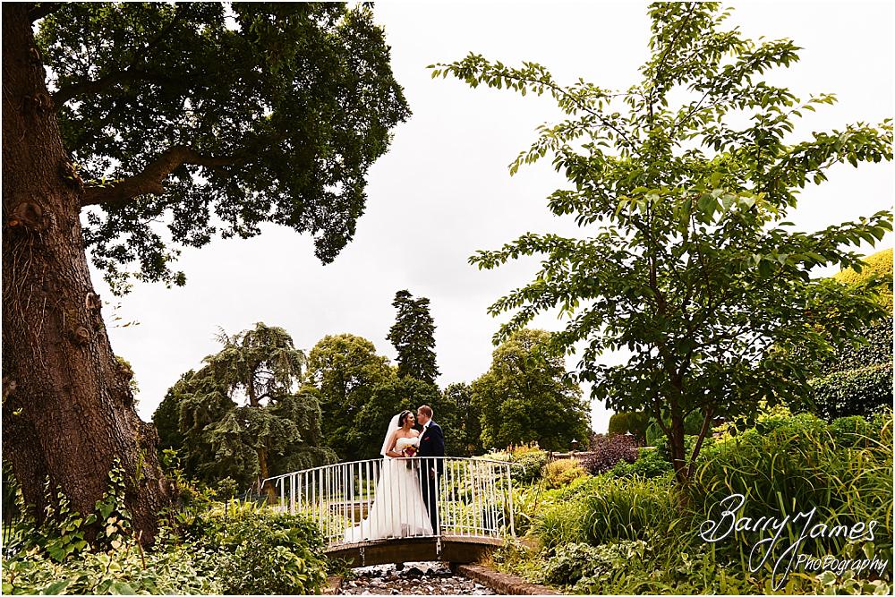Creative natural wedding portraits around the stunning grounds and gardens at Chateau Impney at Droitwich by Wedding Photographer Barry James